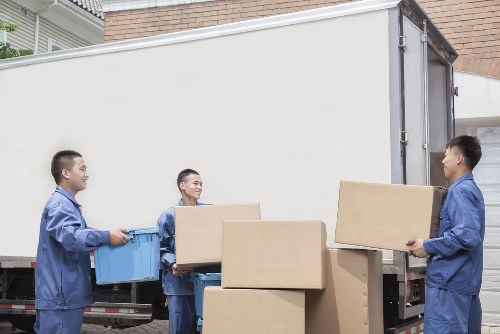 Packed boxes and furniture ready for local removals