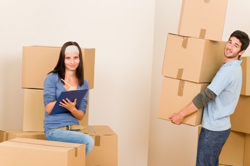 Office moving vehicle loading furniture for a Belvedere business