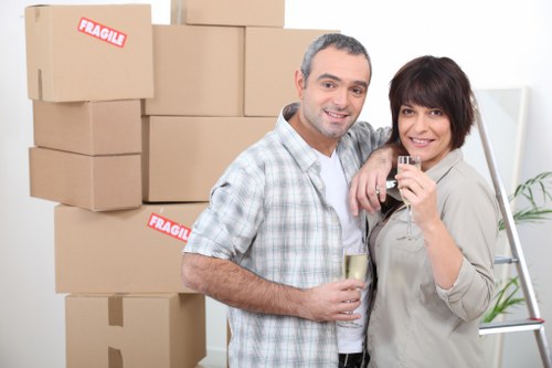Professional removals van assisting with loading and transport